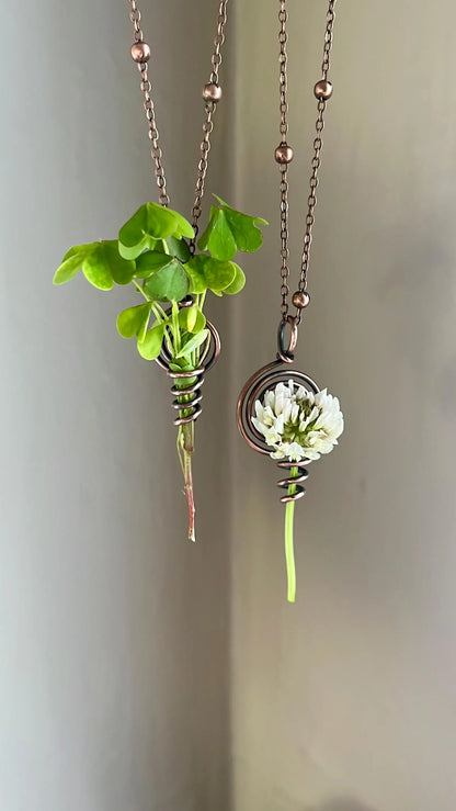 Flower keeper spiral necklace