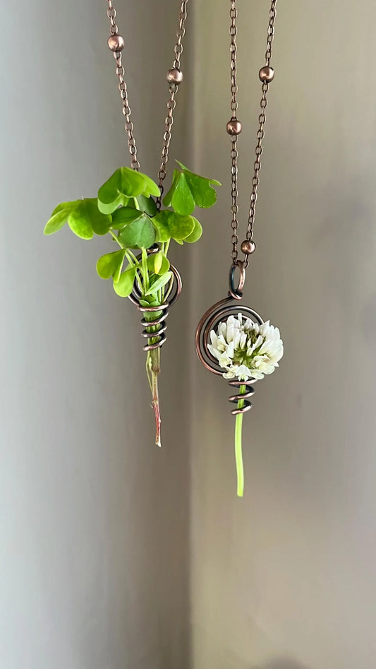 Flower keeper spiral necklace
