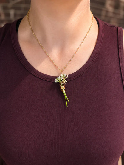 Flower keeper spiral necklace