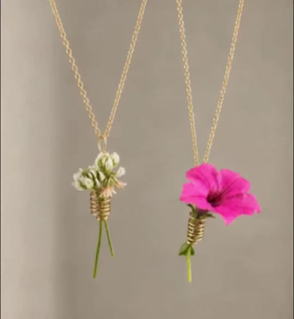 Flower keeper spiral necklace